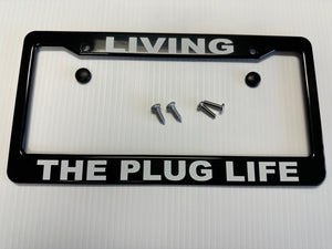 Chevy Volt Black ABS License Plate Frame with lettering "Living The Plug Life"